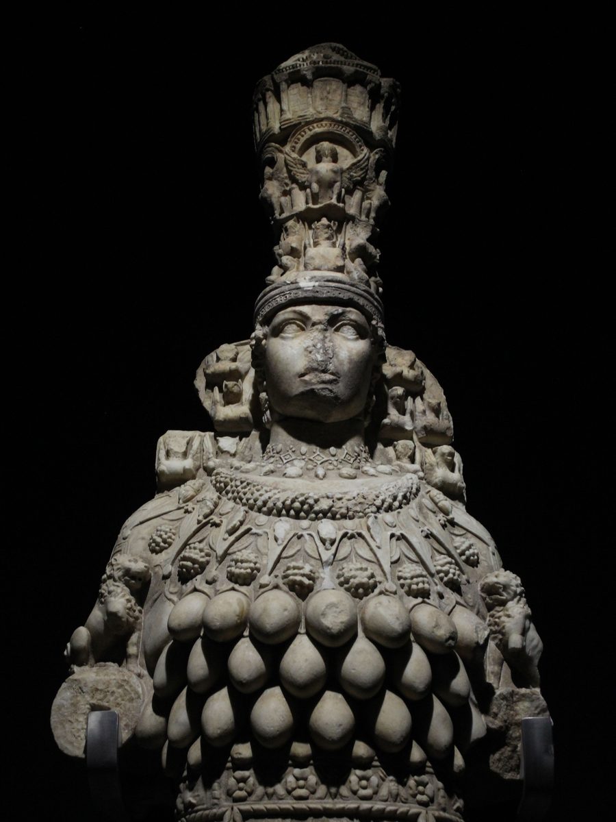 The marble statue of Artemis of Ephesus in the Ephesus Museum at Selçuk, with a tall temple-shaped crown and rows of egg-shaped ornaments across her chest